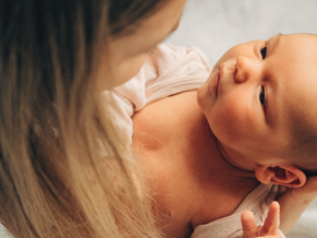 Mum holding baby